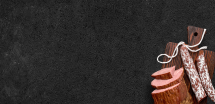 Banner Aufschnitt Brotzeit auf Schieferhintergrund