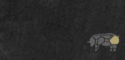 Abbildung Schweinekeule auf Schieferhintergrund