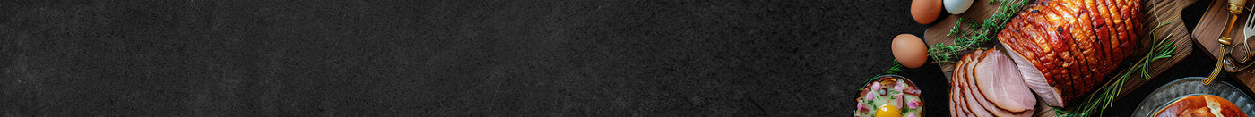 Osterbraten dekoriert mit Eiern auf Schieferhintergrund