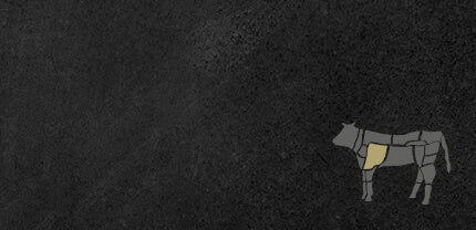 Abbildung Rind Rinderschulter auf Schieferhintergrund