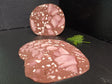 Blutzungenwurst am Stück und geschnitten dekoriert mit Thymian 