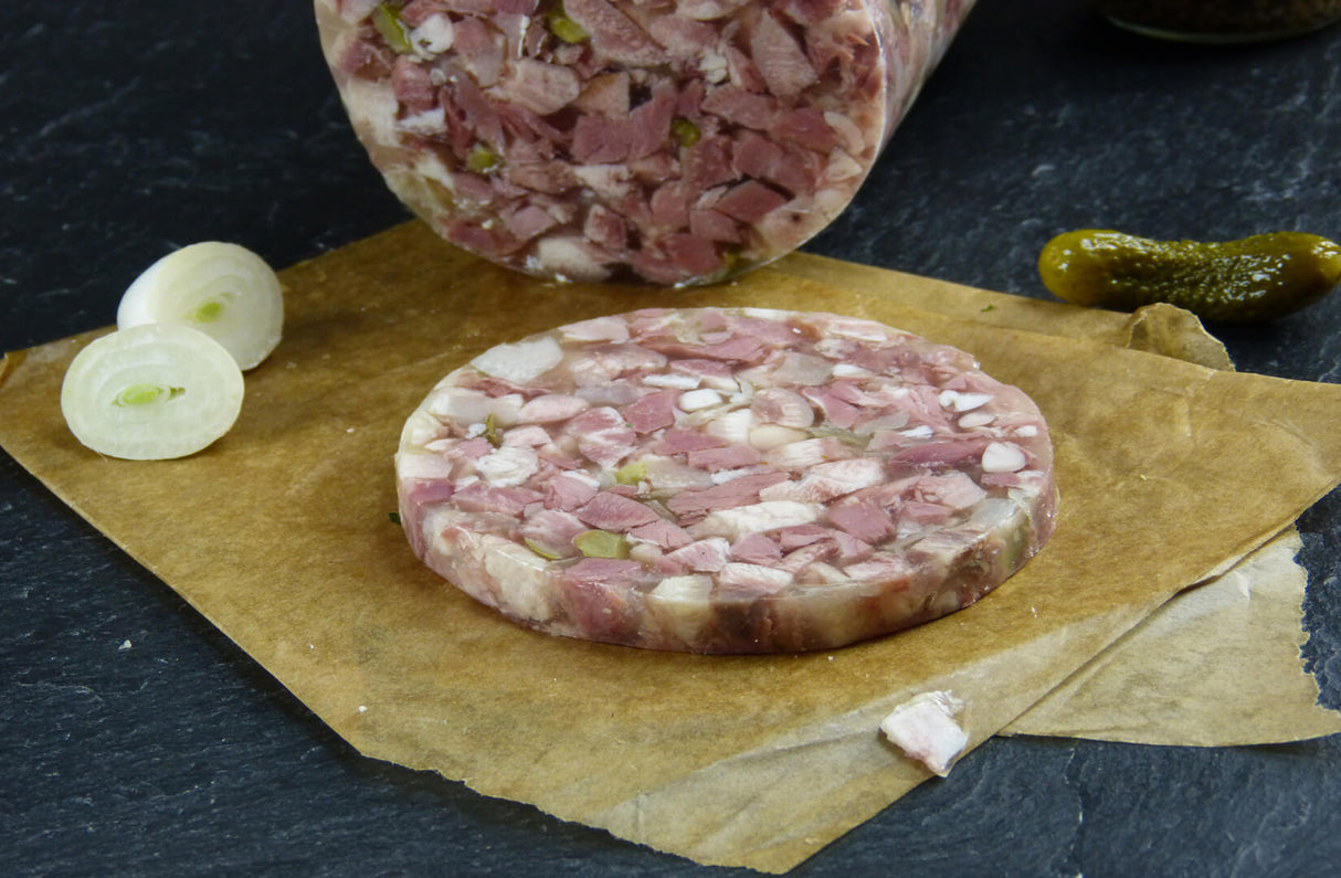 Schweinskopfsülze mit Gurken Riegel